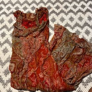 Burnt orange dress with sexy lingerie undergarment .